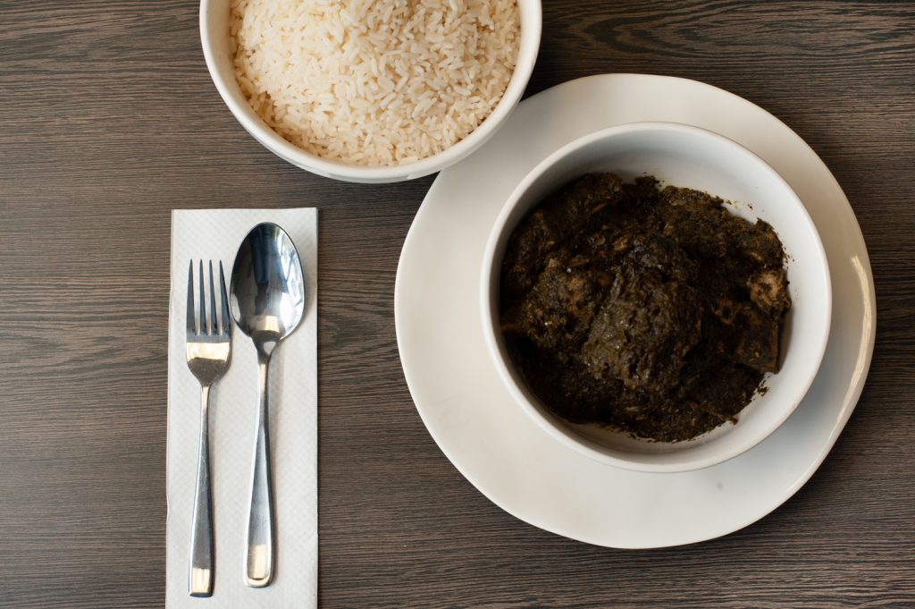 West African Food with Cassava Leaves and Rice